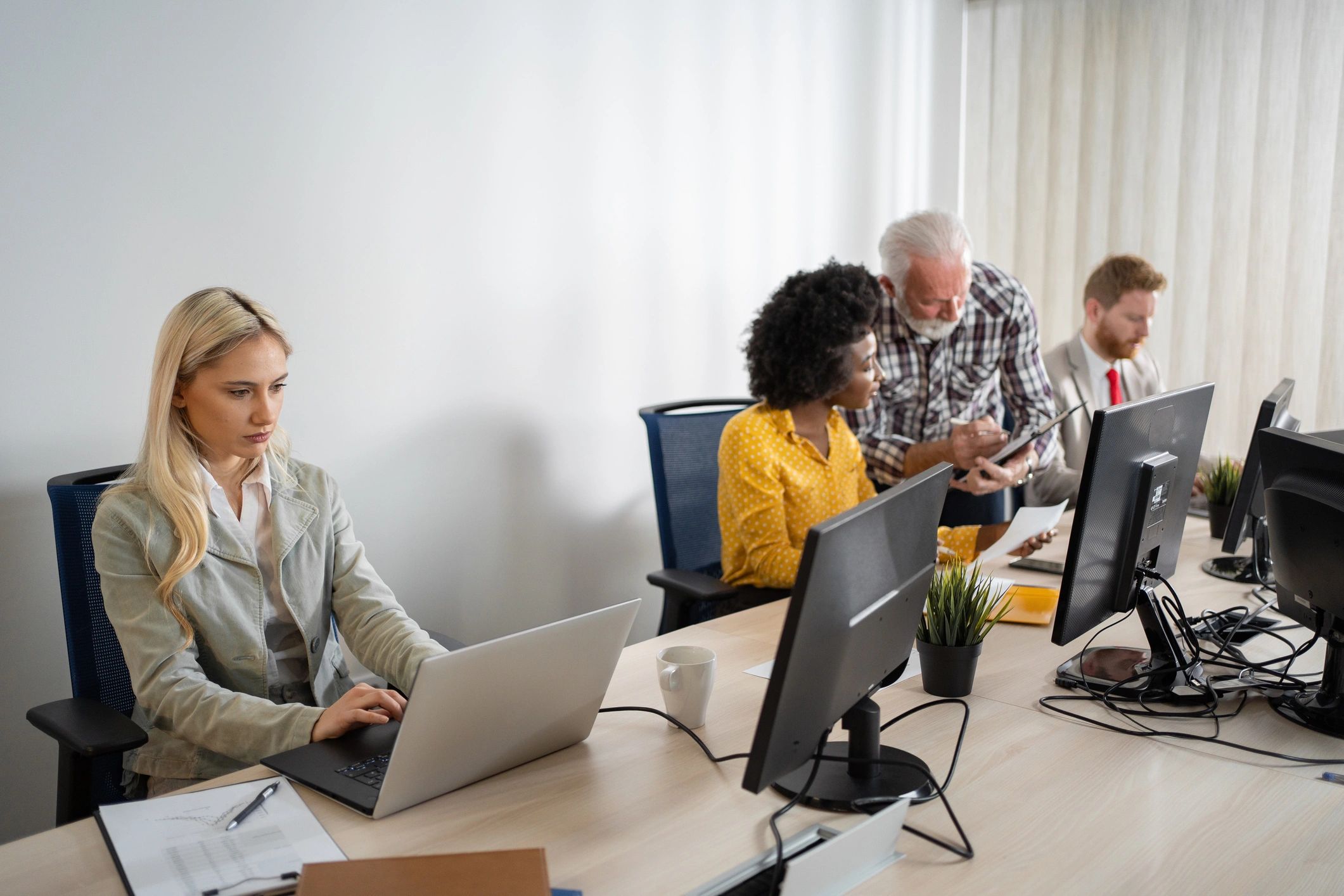Client support team member in office